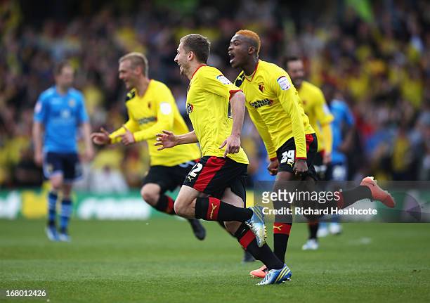 Almen Abdi of Watford celebrates scoring his team's opening goal with Nathaniel Chalobah during the npower Championship match between Watford and...