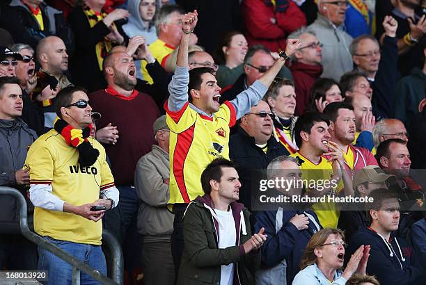Watford fan celebrates after hearing the result between Hull City and Cardiff City during the npower Championship match between Watford and Leeds...