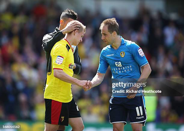 Matej Vydra of Watford is consoled by Luke Varney of Leeds United after the npower Championship match between Watford and Leeds United at Vicarage...