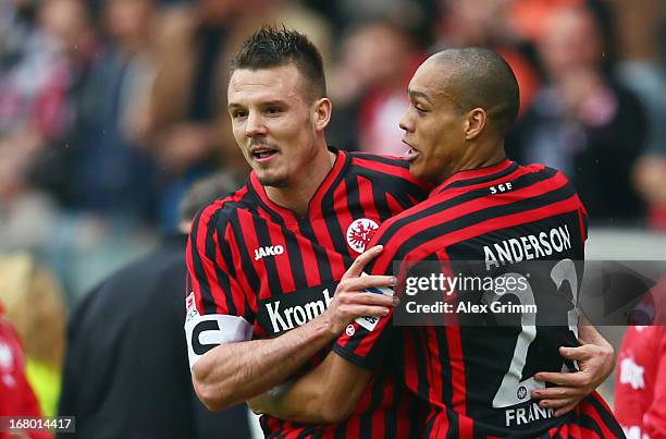 Alexander Meier of Frankfurt celebrates his team's first goal with team mate Bamba Anderson during the Bundesliga match between Eintracht Frankfurt...