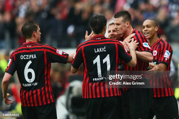 Alexander Meier of Frankfurt celebrates his team's first goal with team mates during the Bundesliga match between Eintracht Frankfurt and Fortuna...