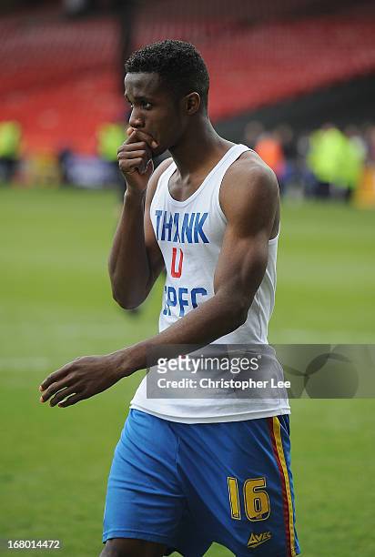 Wilfred Zaha of Palace seems to look emotional as he shows off a t-shirt saying "Thank You CPFC" during the players parade after the match during the...