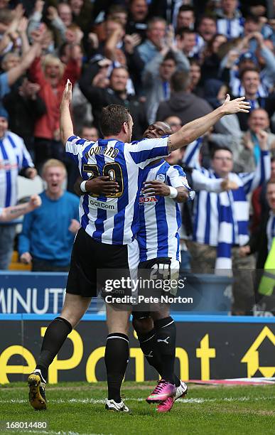 Steve Howard of Sheffield Wednesday celebrates with team mate Leroy Lita after scoring his sides first goal during the npower Championship match...