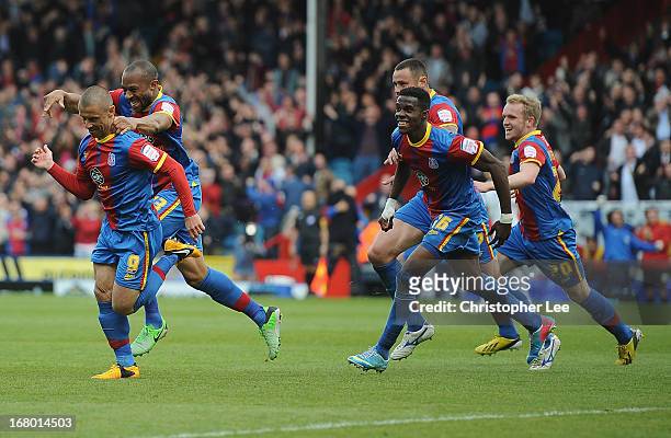Kevin Phillips of Palace is chased by his team mates after he scores their second goal during the npower Championship match between Crystal Palace...