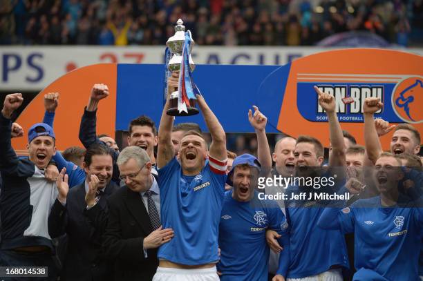 Lee McCulloch of Rangers lifts the IRN - BRU Scottish Third Division trophy following their victory over Berwick Rangers at Ibrox Stadium on May 4,...