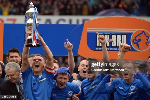 Lee McCulloch of Rangers lifts the IRN - BRU Scottish Third Division trophy following their victory over Berwick Rangers at Ibrox Stadium on May 4,...