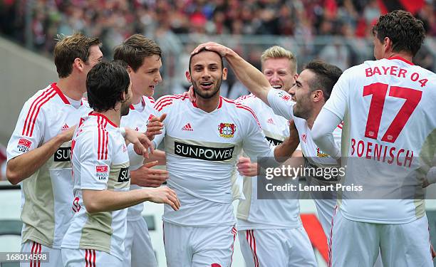 Oemer Toprak of Leverkusen and his teammates celebrate a goal during the Bundesliga match between 1. FC Nuernberg and Bayer 04 Leverkusen at Stadium...