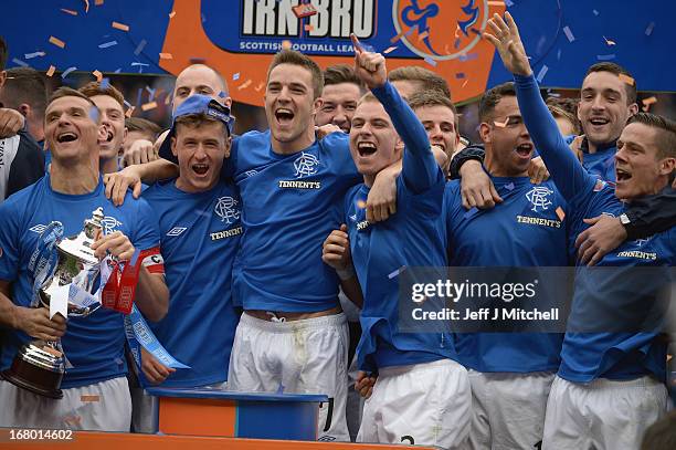 Lee McCulloch of Rangers lifts the IRN - BRU Scottish Third Division trophy following their victory over Berwick Rangers at Ibrox Stadium on May 4,...