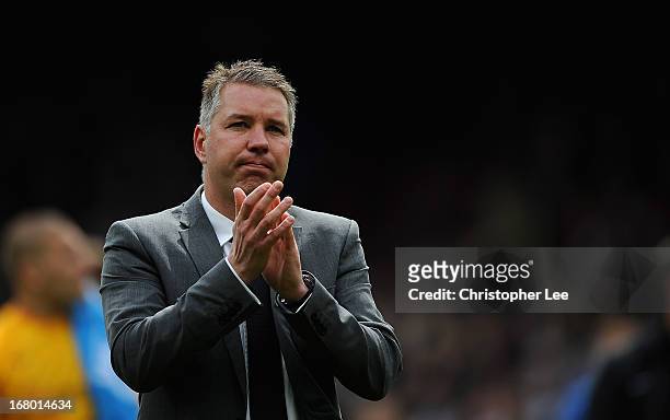 Manager Darren Ferguson of Peterborough looks dejected as he appaulds their fans during the npower Championship match between Crystal Palace and...