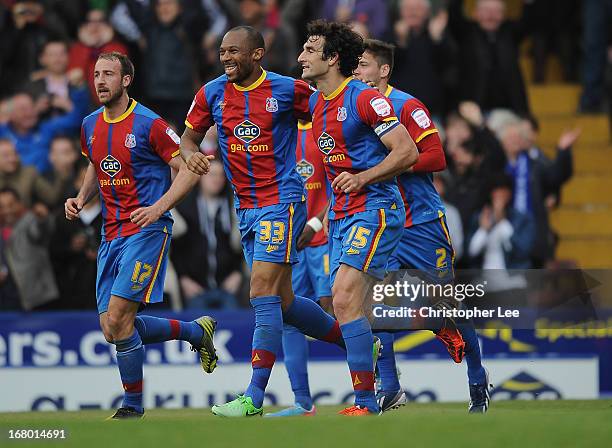 Mile Jedinak of Palace celebrates scoring their winning goal with Danny Gabbidon during the npower Championship match between Crystal Palace and...