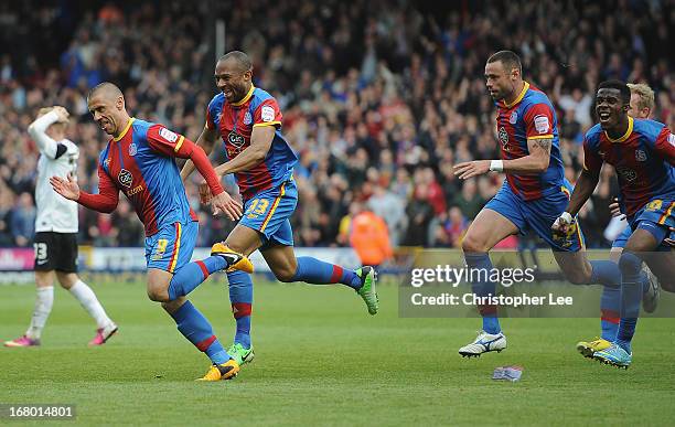 Kevin Phillips of Palace is chased by his team mates after he scores their second goal during the npower Championship match between Crystal Palace...