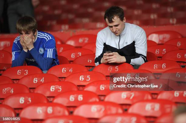 Peterborough fans look dejected as they are relegated during the npower Championship match between Crystal Palace and Peterborough United at Selhurst...