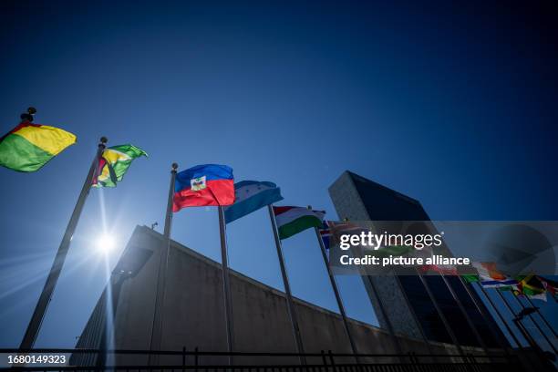 September 2023, USA, New York: Flags fly in front of the United Nations headquarters during the UN General Assembly in New York. Photo: Michael...