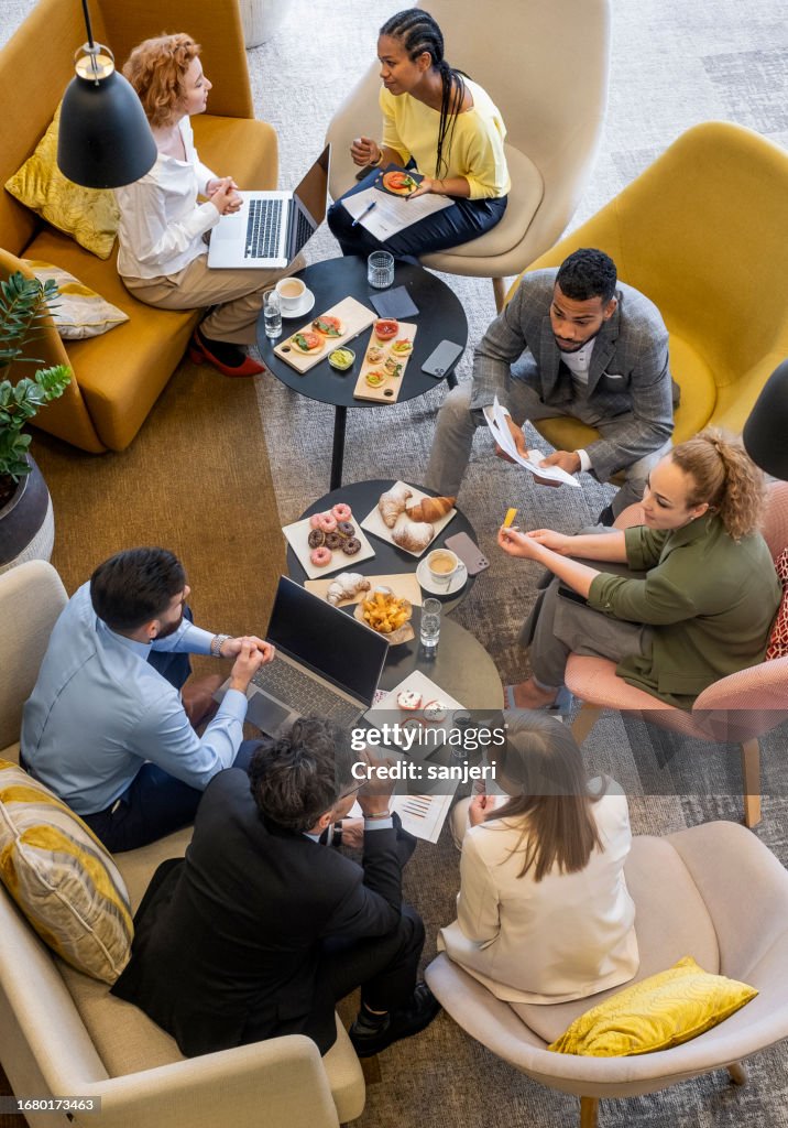 Business people having a brunch meeting