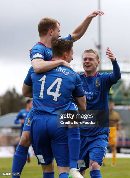 Billy Mckay of Inverness Caledonian Thistle celebrates with team-mates Andrew Shinnie and Josh Meekings after scoring during the Clydesdale Bank...