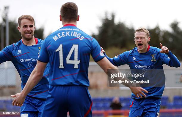 Billy Mckay of Inverness Caledonian Thistle celebrates with team-mates after scoring during the Clydesdale Bank Scottish Premier League match between...