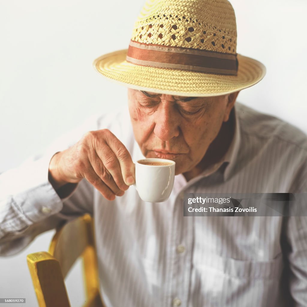 Portrait of a senior man drinking coffee