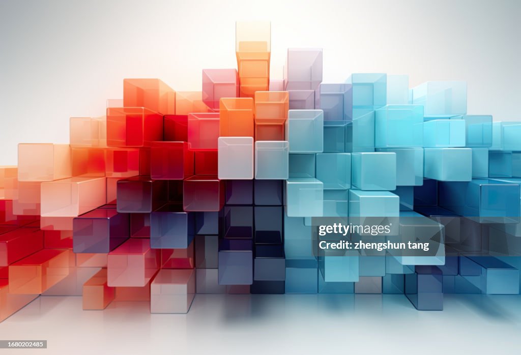 Close-up of multi colored transparent cubes against white background