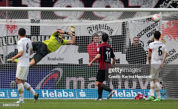 Alexander Meier of Frankfurt shoots the goal to 3:1 against goalkeeper Markus Krauss during the Bundesliga match between Eintracht Frankfurt and...