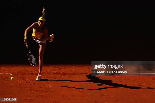 Daniela Hantuchova of Slovakia serves in her match against Sloane Stephens of USA during the Mutua Madrid Open tennis tournament at the Caja Magica...
