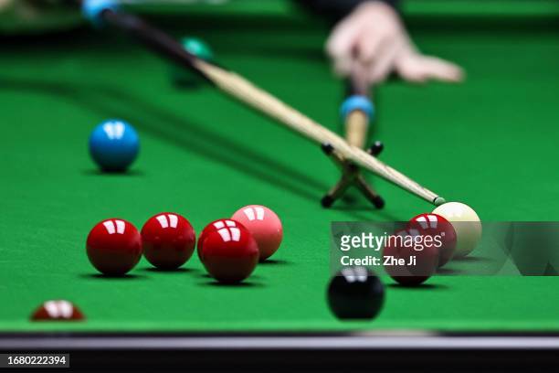 John Higgins of Scotland plays a shot in the quarter-final match against Ronnie O'Sullivan of England on Day 4 of World Snooker Shanghai Masters 2023...
