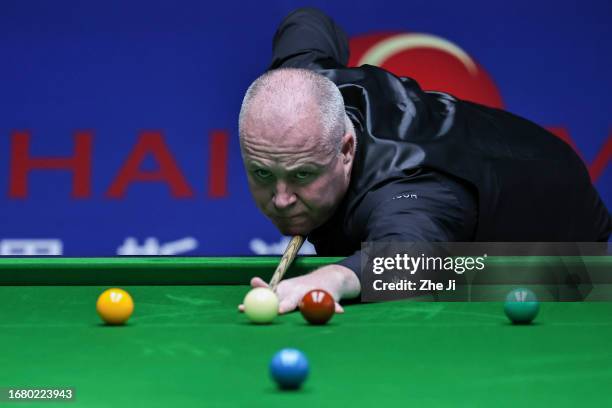 John Higgins of Scotland plays a shot in the quarter-final match against Ronnie O'Sullivan of England on Day 4 of World Snooker Shanghai Masters 2023...