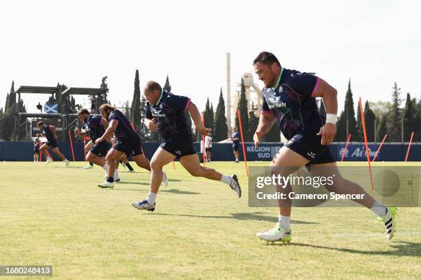 Nel and Zander Fagerson of Scotland sprint during a training session at the Rugby World Cup France 2023 at Stade des Arboras on September 14, 2023 in...