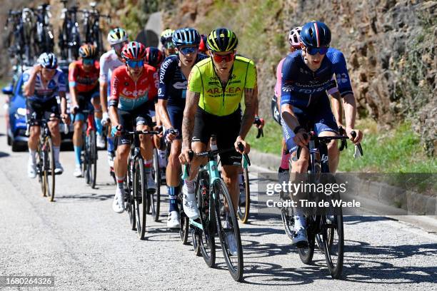 Hugo Hofstetter of France and Team Arkéa Samsic and Lewis Askey of The United Kingdom and Team Groupama - FDJ compete in the breakaway during the...