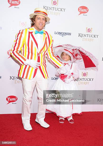 Larry Birkhead and Dannielynn Birkhead attend the 139th Kentucky Derby at Churchill Downs on May 4, 2013 in Louisville, Kentucky.