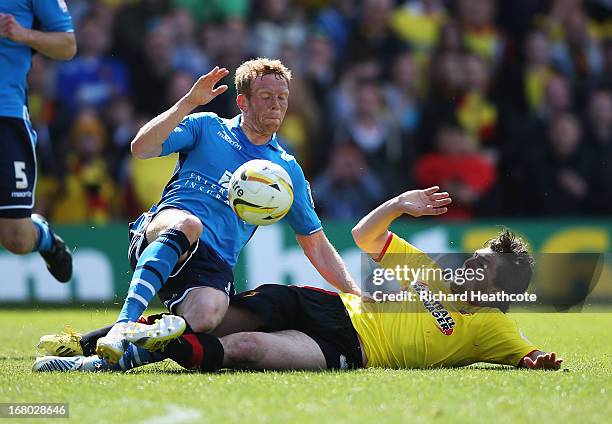 Fernando Forestieri of Watford tackles Paul Green of Leeds United during the npower Championship match between Watford and Leeds United at Vicarage...