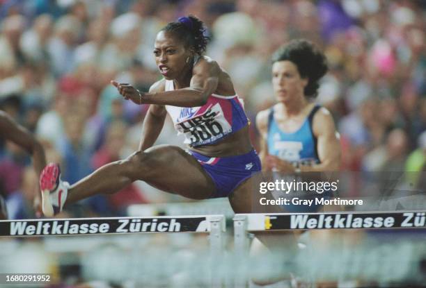 Gail Devers from the United States competes in the Women's 100 Metres Hurdles race at the IAAF Mobil Grand Prix Weltklasse Zurich on 4th August 1993...