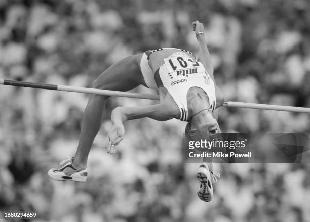 , Gold medalist Hanne Haugland from Norway clears the bar in the Women's High Jump competition at the 6th International Association of Athletics...