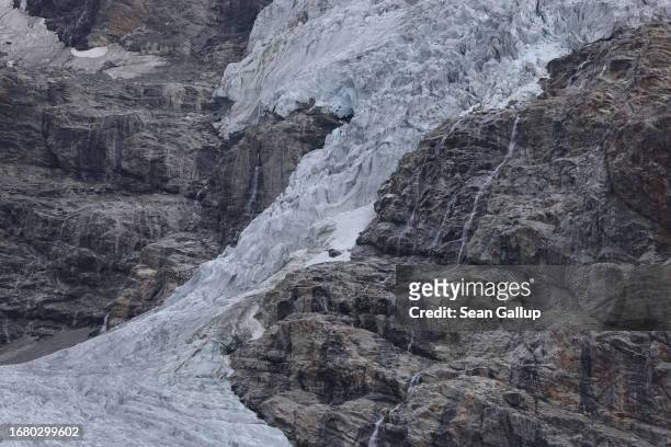 The tongue of the Pasterze glacier descends between rock it once covered on September 13, 2023 near Heiligenblut, Austria. Scientists from the...