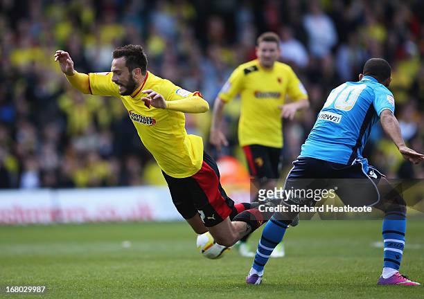 Marco Cassetti of Watford goes to ground after a challenge by Ryan Hall of Leeds United during the npower Championship match between Watford and...