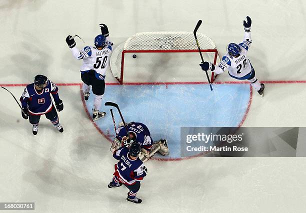 Juhamatti Aaltonen of Finland celebrates after he scores his team's opening goal during the IIHF World Championship group H match between Finland and...