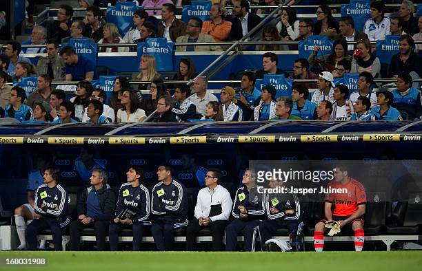 Head coach Jose Mourinho of Real Madrid and now reserve goalkeeper Iker Casillas sit on the bench towards the end of the la Liga match between Real...