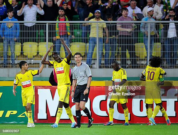 Lacina Traore of FC Anzhi Makhachkala celebrates with team-mates after scoring a goal during the Russian Premier League match between FC Anzhi...