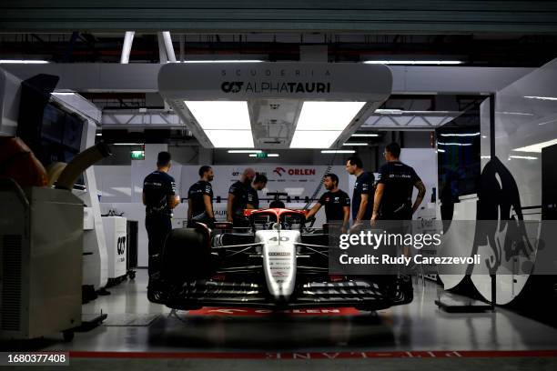 The car of Liam Lawson of New Zealand and Scuderia AlphaTauri is seen in the garage during previews ahead of the F1 Grand Prix of Singapore at Marina...