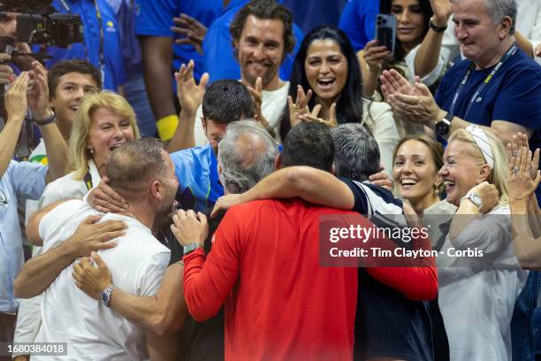 September 10: Novak Djokovic of Serbia celebrates with his team after his victory against Daniil Medvedev of Russia in the Men's Singles Final on...