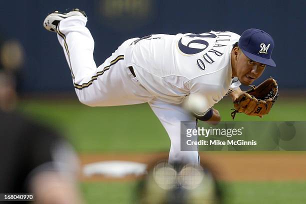 Yovani Gallardo of the Milwaukee Brewers pitches in the top of the first inning against the St. Louis Cardinals at Miller Park on May 04, 2013 in...