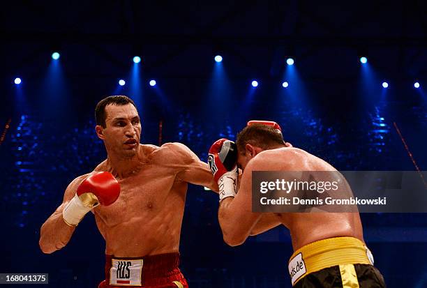 Wladimir Klitschko of Ukraine lands a punch against Francesco Pianeta during their IBF, IBO, WBA, WBO World Championship fight at SAP Arena on May 4,...