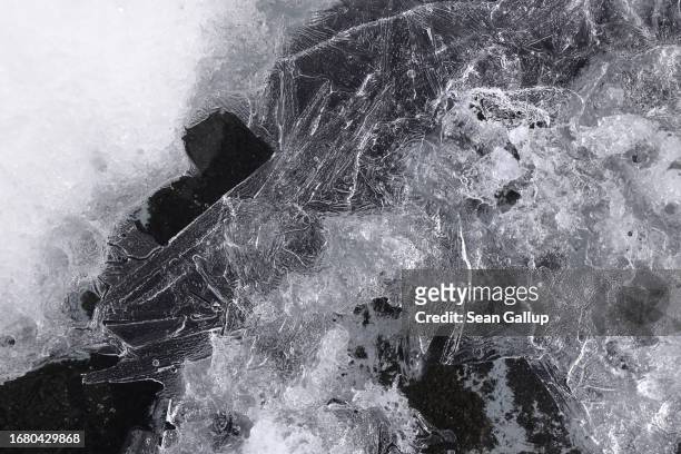 Ice chrystallizes above heat-absorbing alpine dust on the plateau of the Pasterze glacier on September 12, 2023 near Heiligenblut, Austria. The...