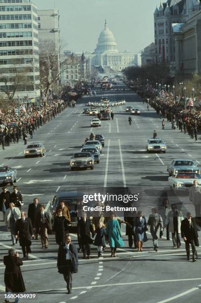 President Jimmy Carter, First Lady Rosalynn Carter and their daughter Amy walk in the Inaugural Parade from the Capitol to the White House in...