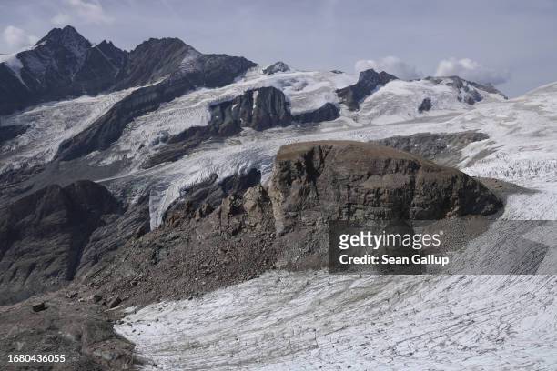 Ice descends from the plateau of the Pasterze glacier on September 12, 2023 near Heiligenblut, Austria. The Pasterze is losing length and depth in a...