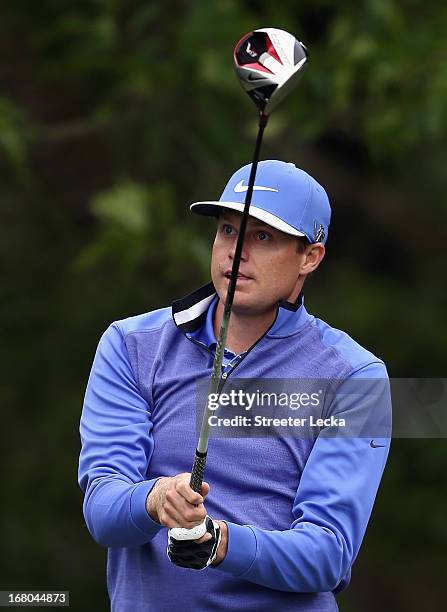 Nick Watney watches his tee shot on the 12th hole during the third round of the Wells Fargo Championship at Quail Hollow Club on May 4, 2013 in...