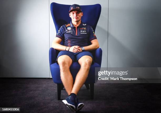Max Verstappen of the Netherlands and Oracle Red Bull Racing looks on in the Paddock during previews ahead of the F1 Grand Prix of Singapore at...