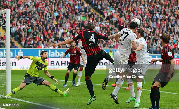 Marco Russ of Frankfurt tries to score against goalkeeper Fabian Giefer of Duesseldorf during the Bundesliga match between Eintracht Frankfurt and...