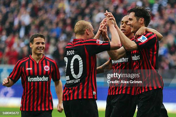 Srdjan Lakic of Frankfurt celebrates his team's second goal with team mates Bamba Anderson, Sebastian Rode and Stefano Celozzi during the Bundesliga...