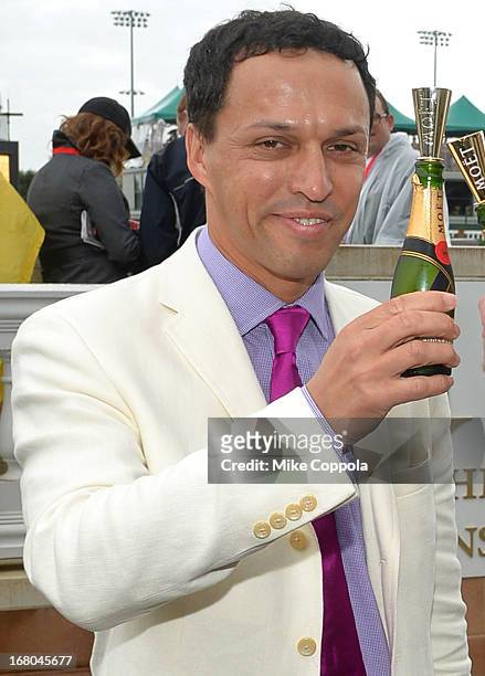Jon Potter, EVP of Brands, Moet Hennessy toasts the 139th Kentucky Derby with Moët & Chandon at Churchill Downs on May 4, 2013 in Louisville,...