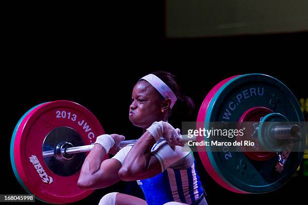 Beatriz Piron of Dominican Republic A competes in the Women's 48kg clean and jerk during day one of the 2013 Junior Weightlifting World Championship...